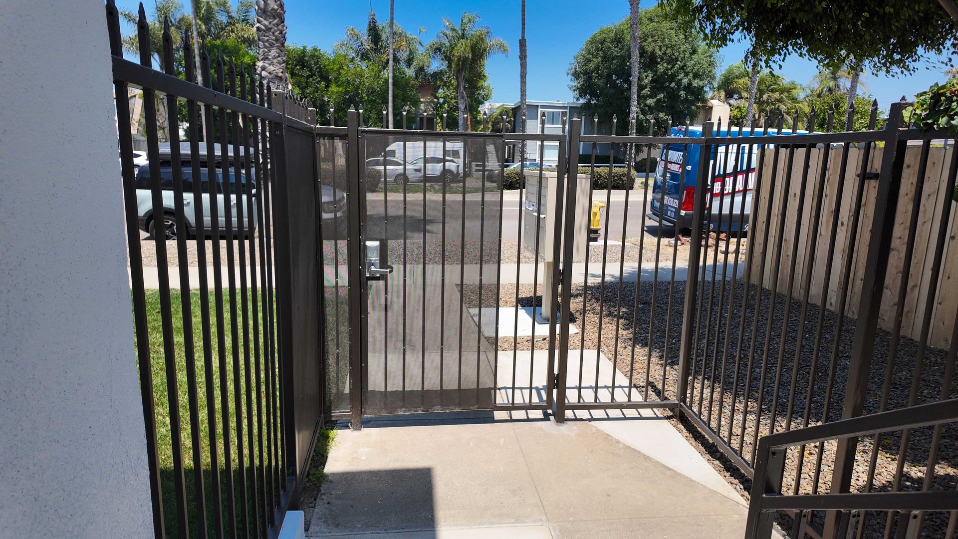 Custom iron driveway security gate